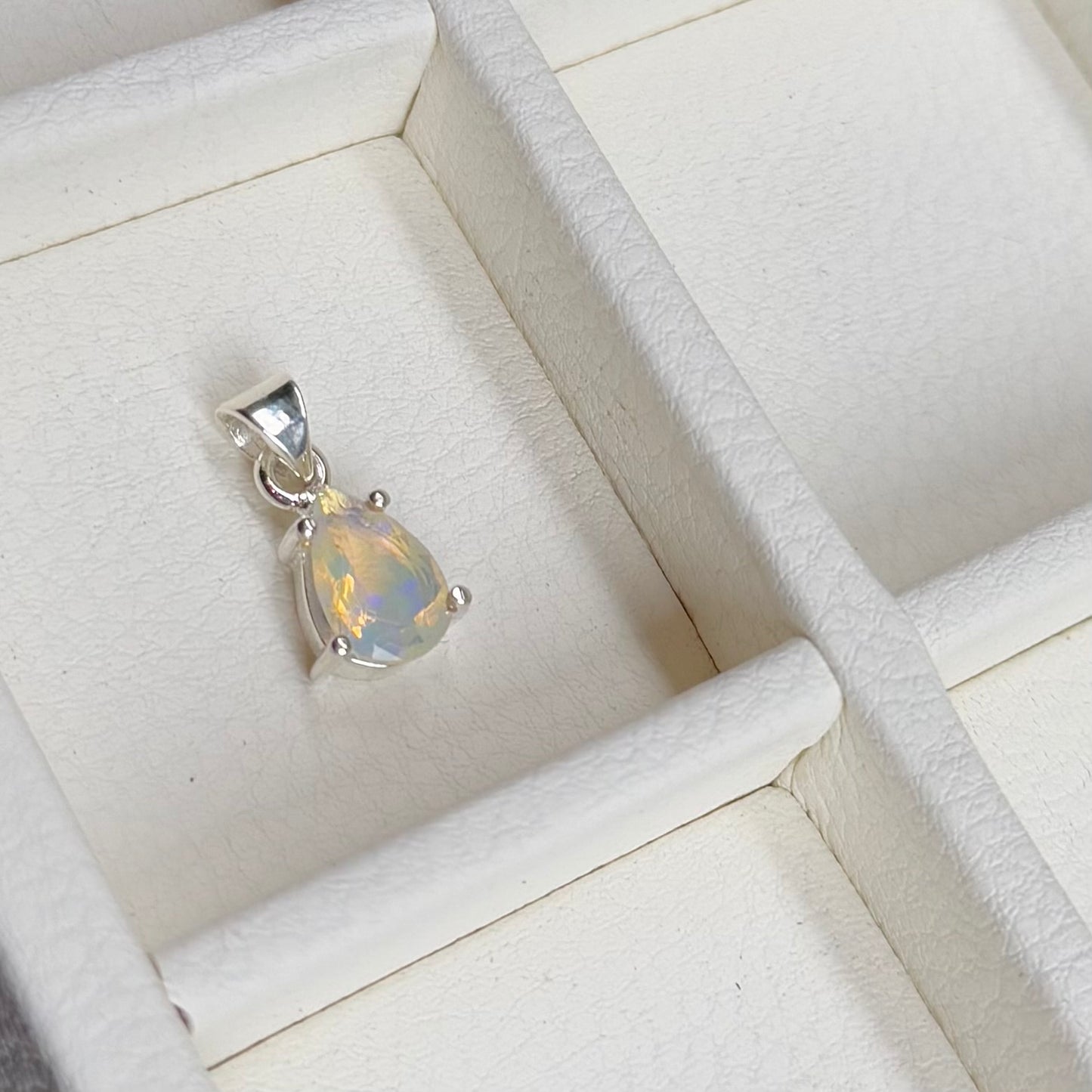 Opal charm