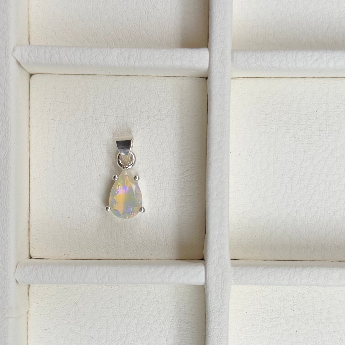 Opal charm