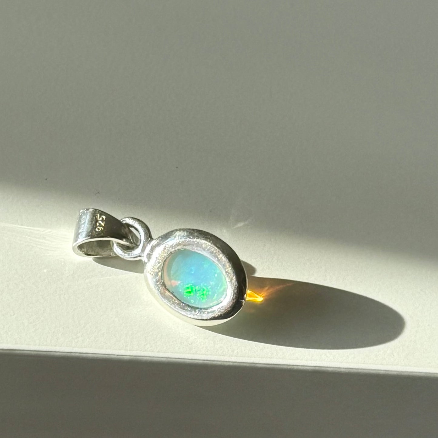 Opal charm