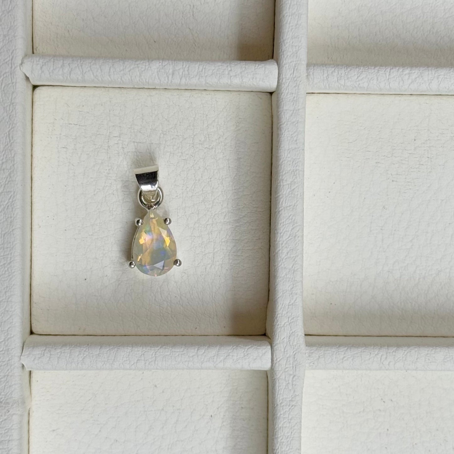 Opal charm