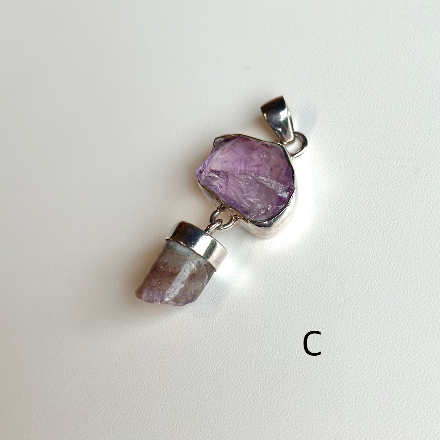 Stone charm