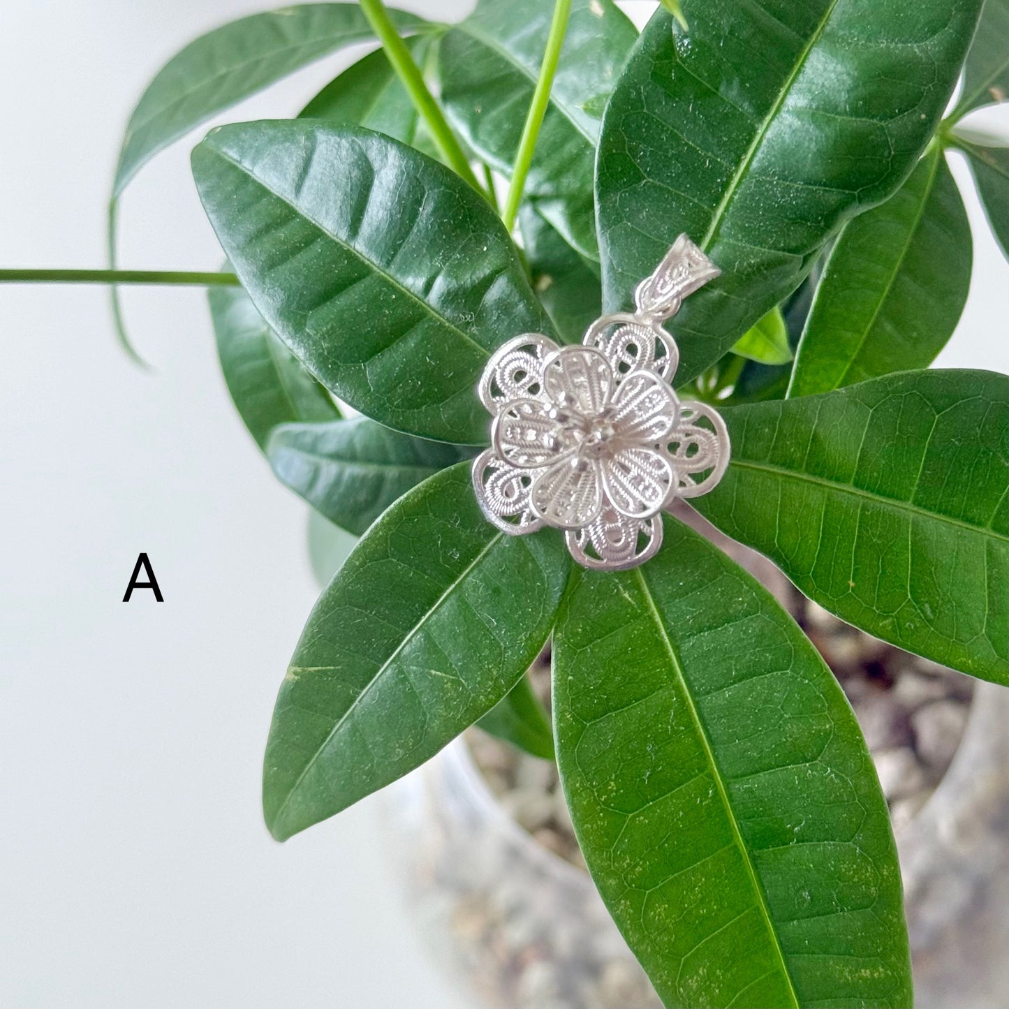 Filigree charm