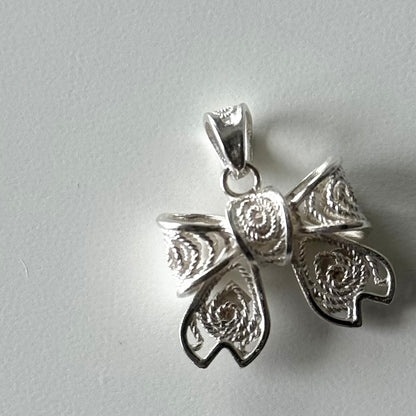 Filigree charm