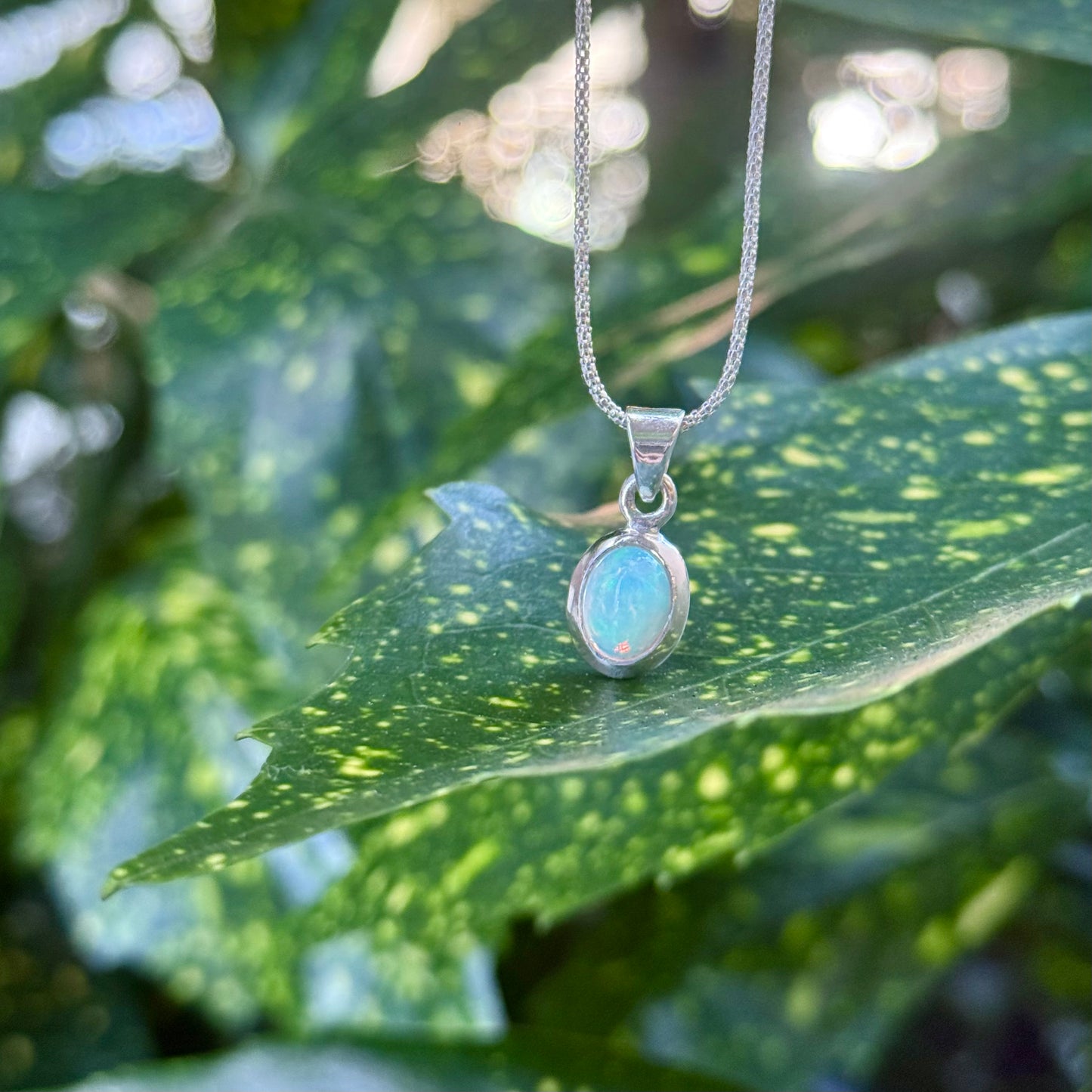 Opal charm