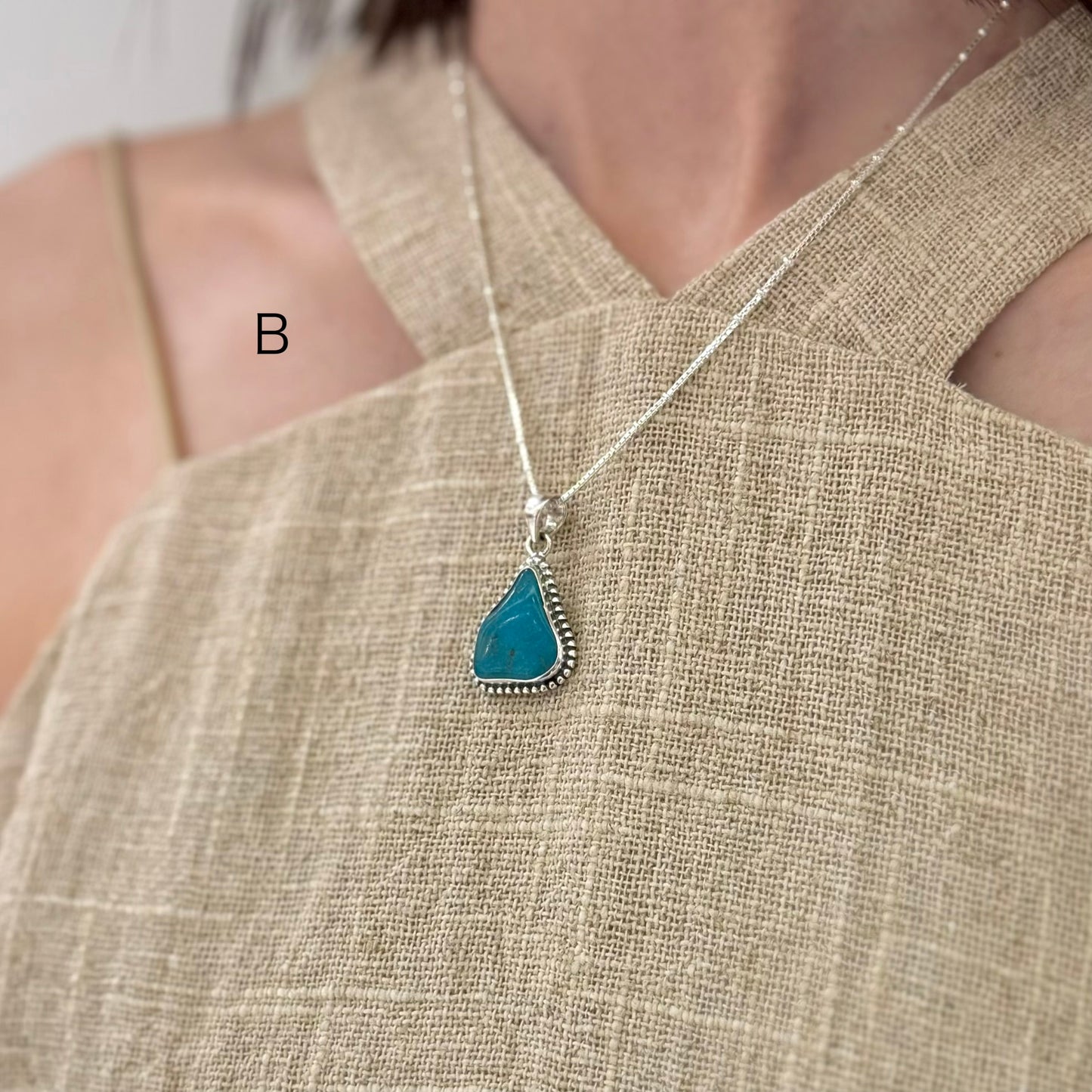 American turquoise charm