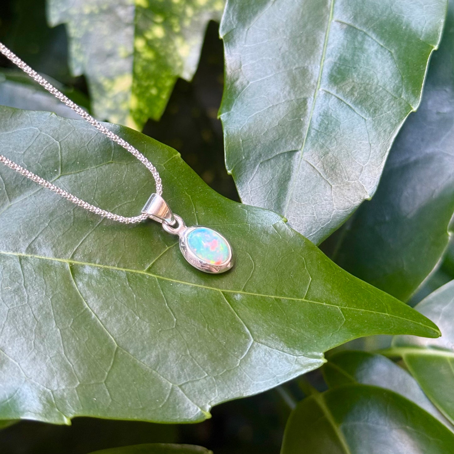 Opal charm