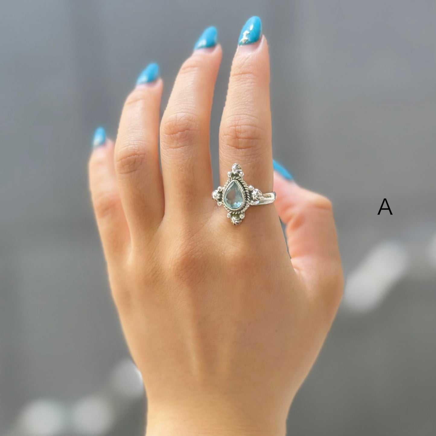 Blue topaz ring