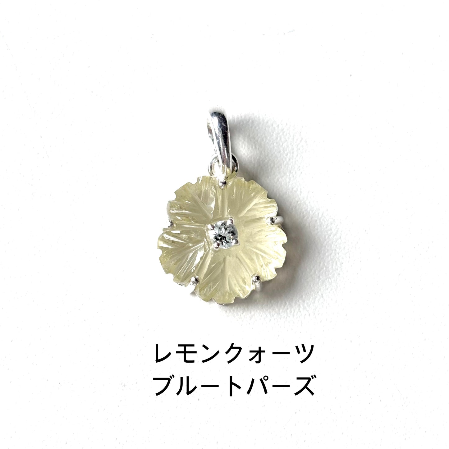 Flower carved charm