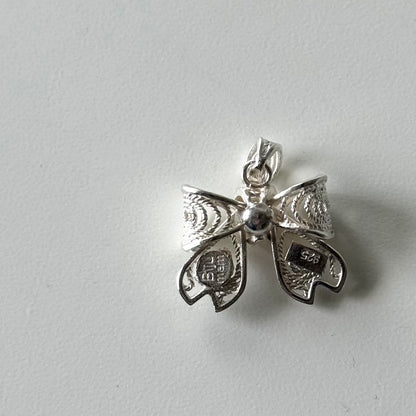 Filigree charm
