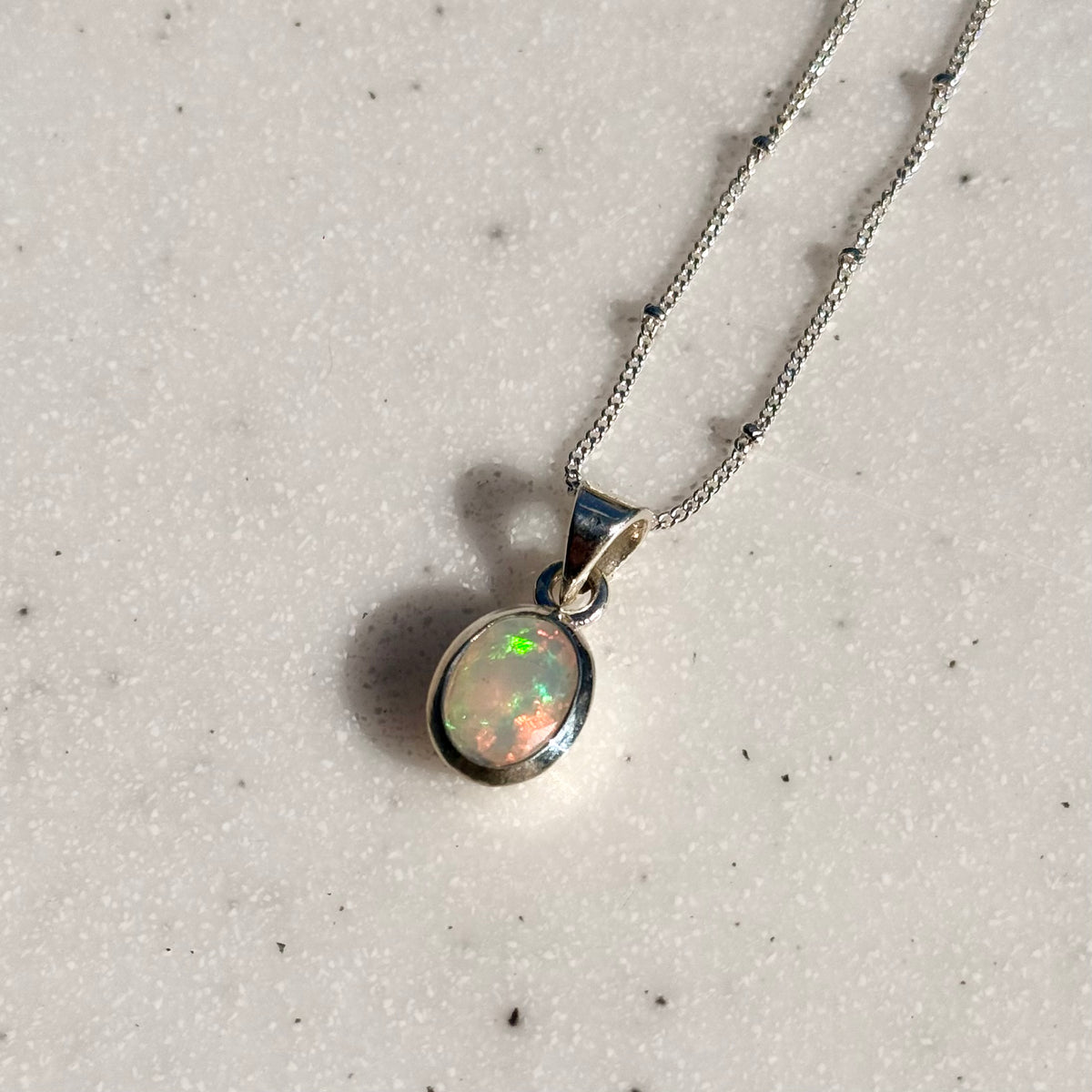 Opal charm 1