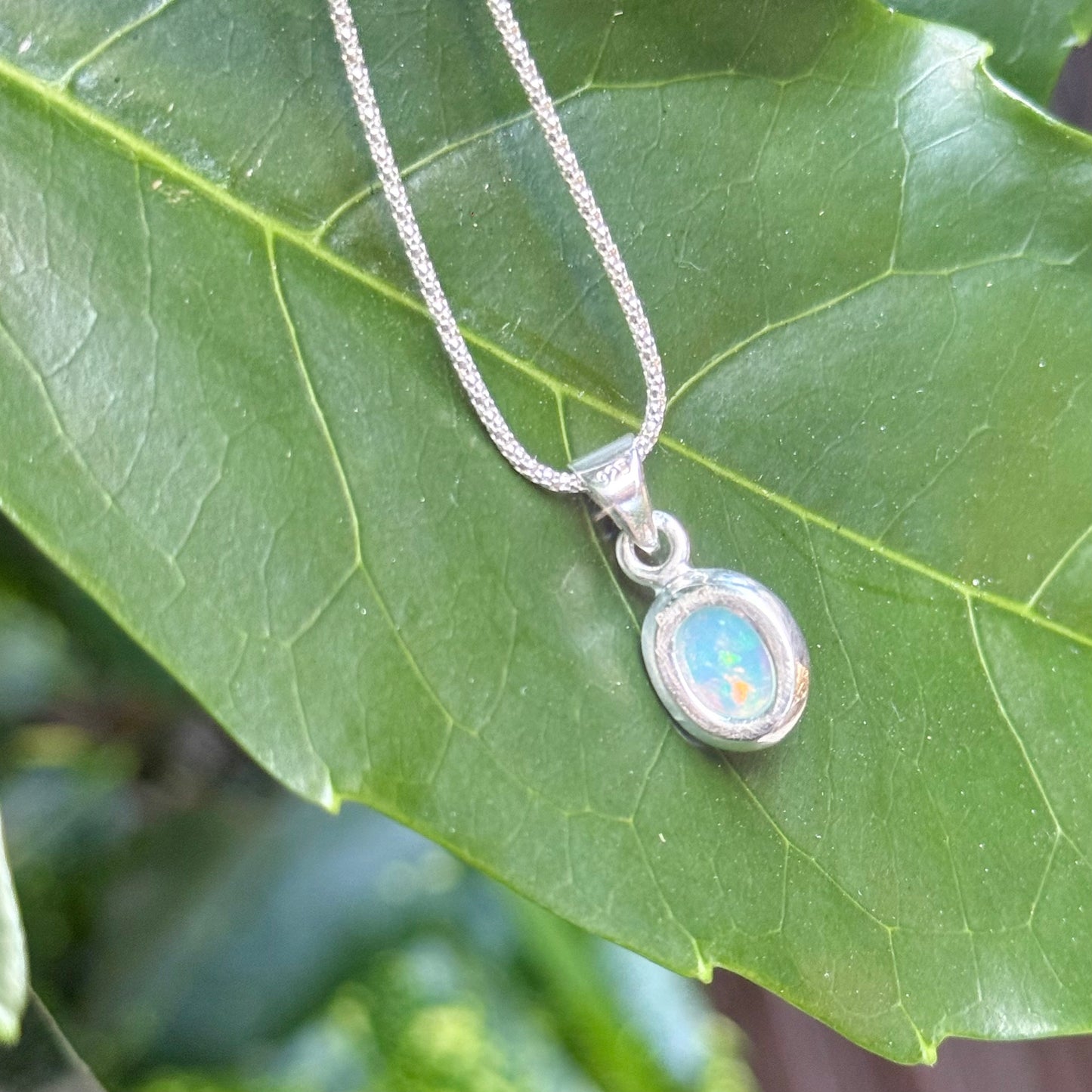 Opal charm