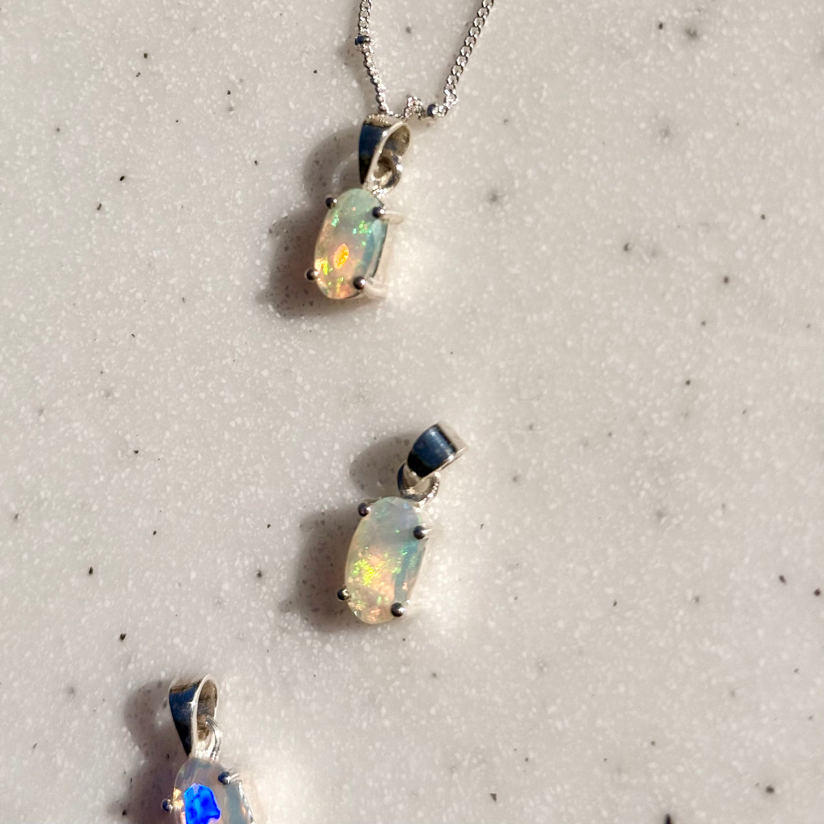 Opal charm