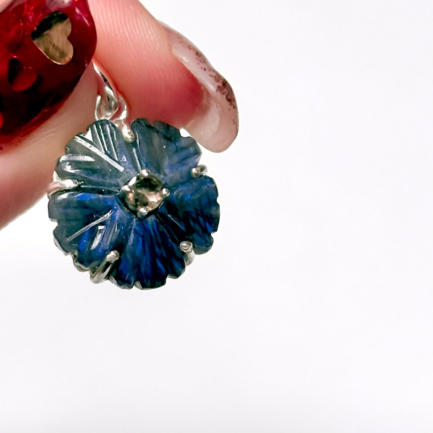 Flower carved charm