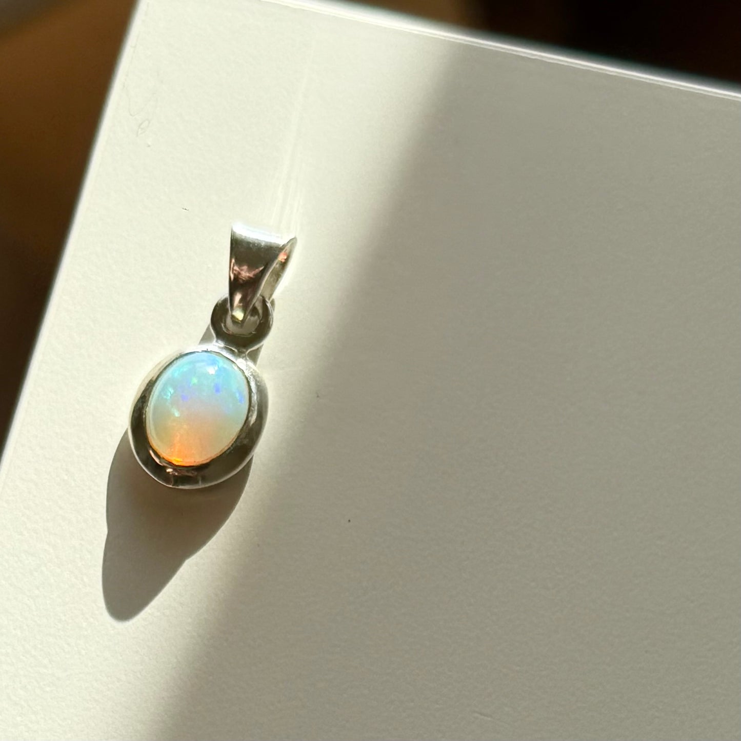 Opal charm