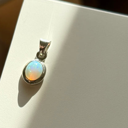 Opal charm