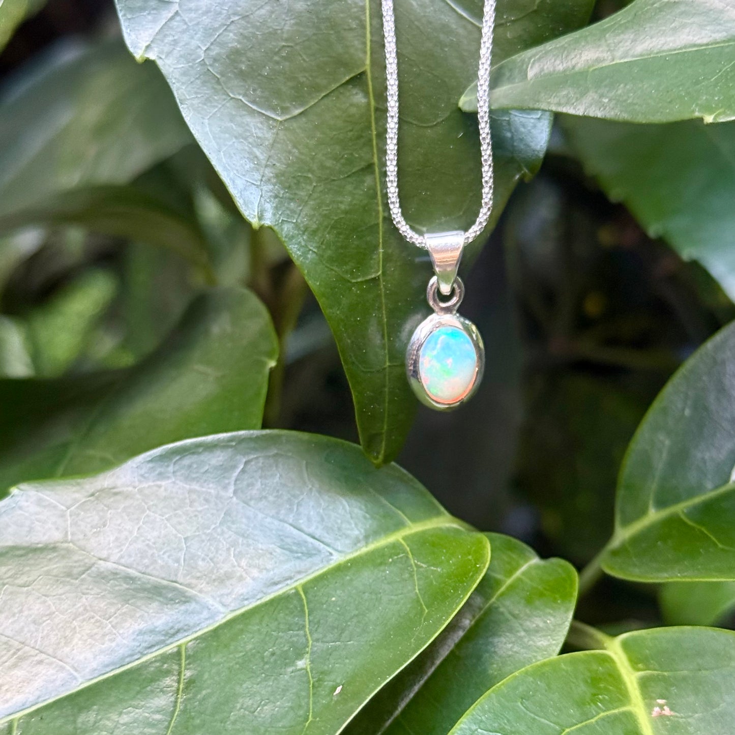 Opal charm