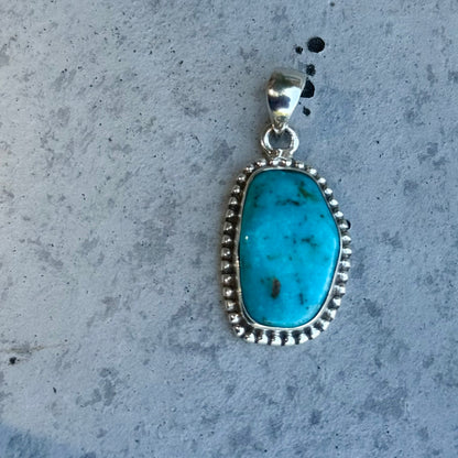 American turquoise charm