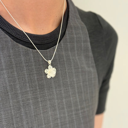 Filigree charm