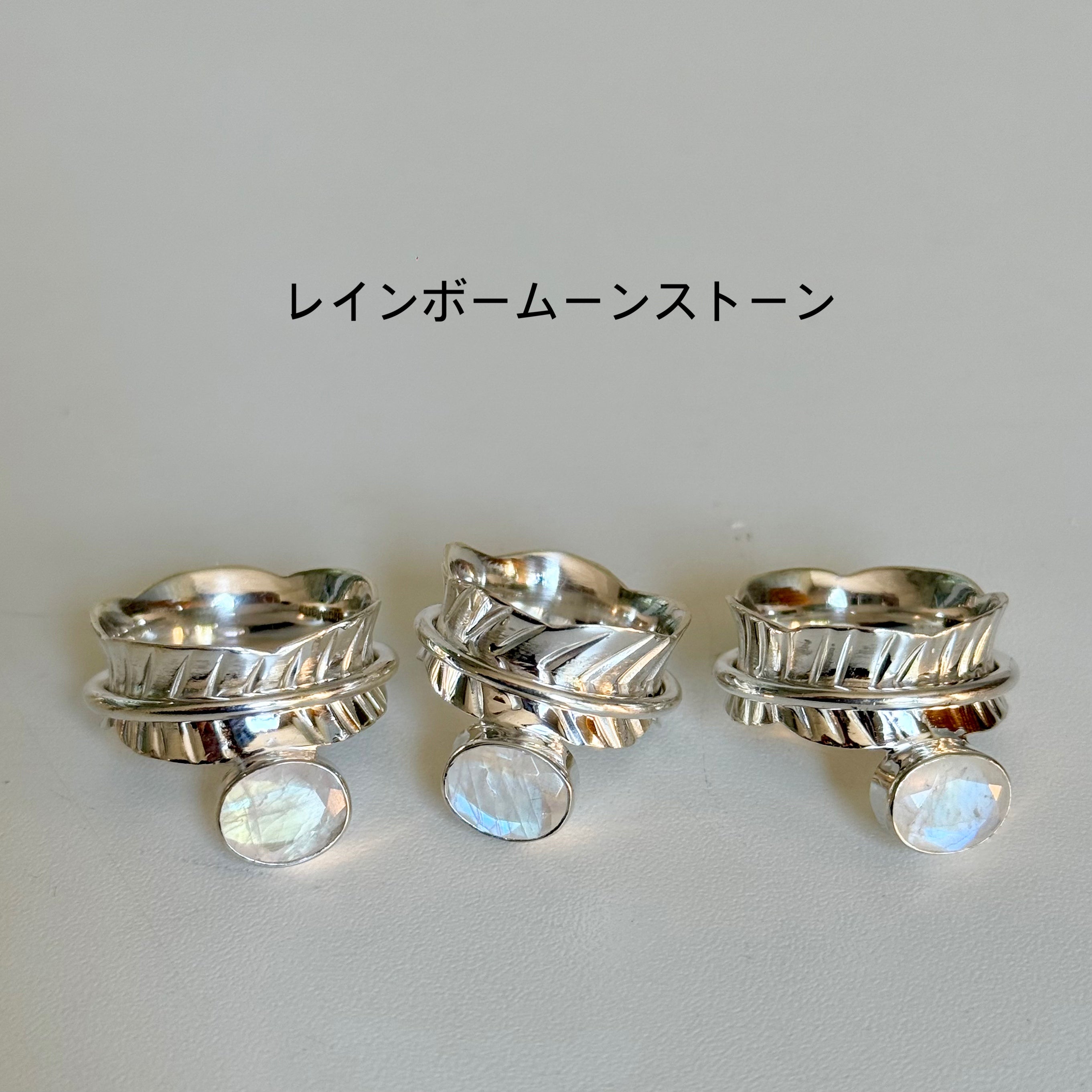 Feather × Stone Rolling ring – Biju mam