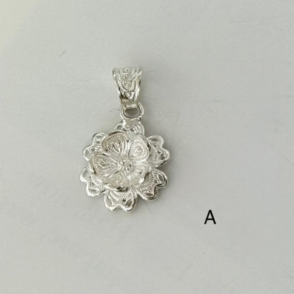 Filigree flower charm