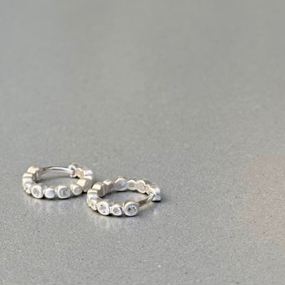 White topaz pierce