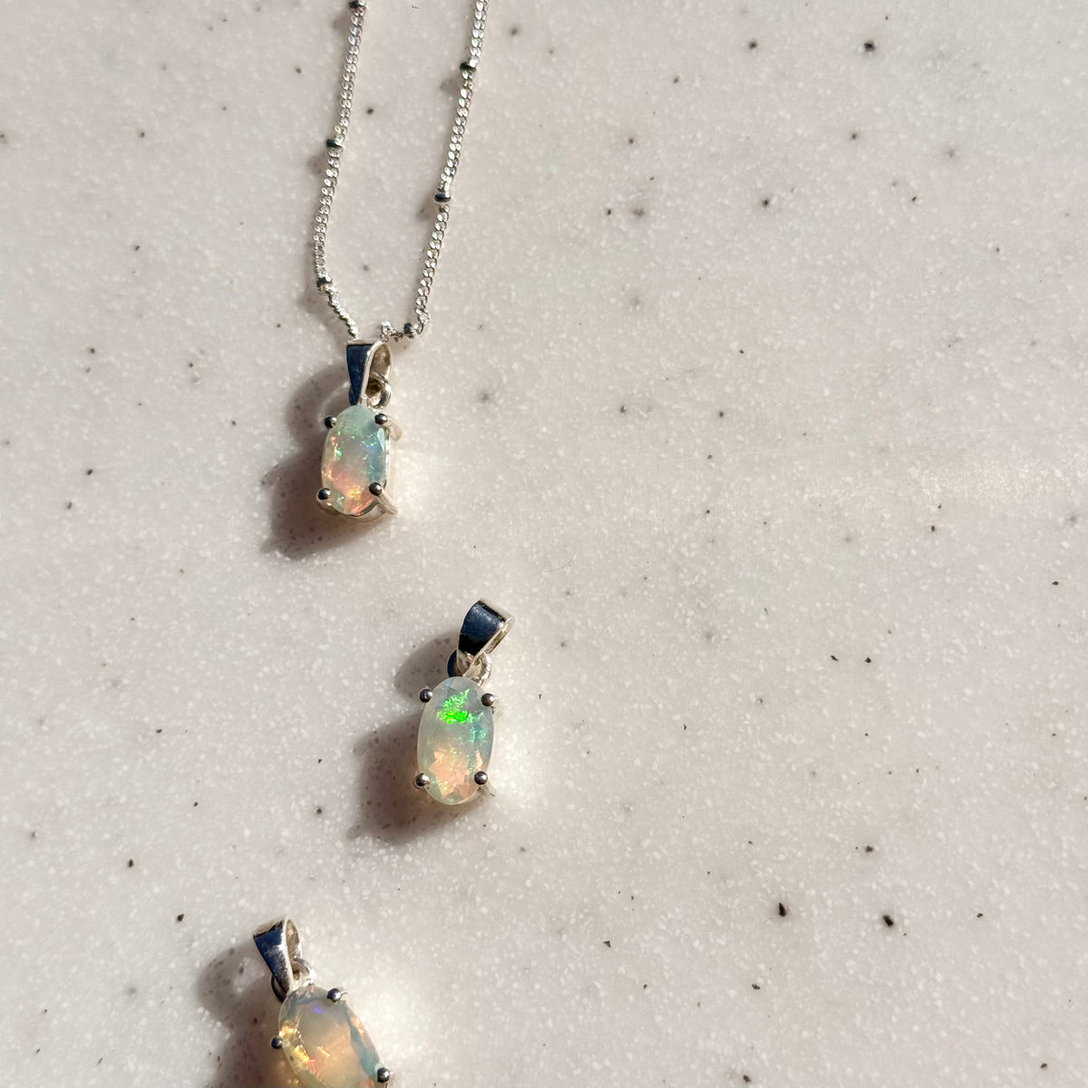 Opal charm
