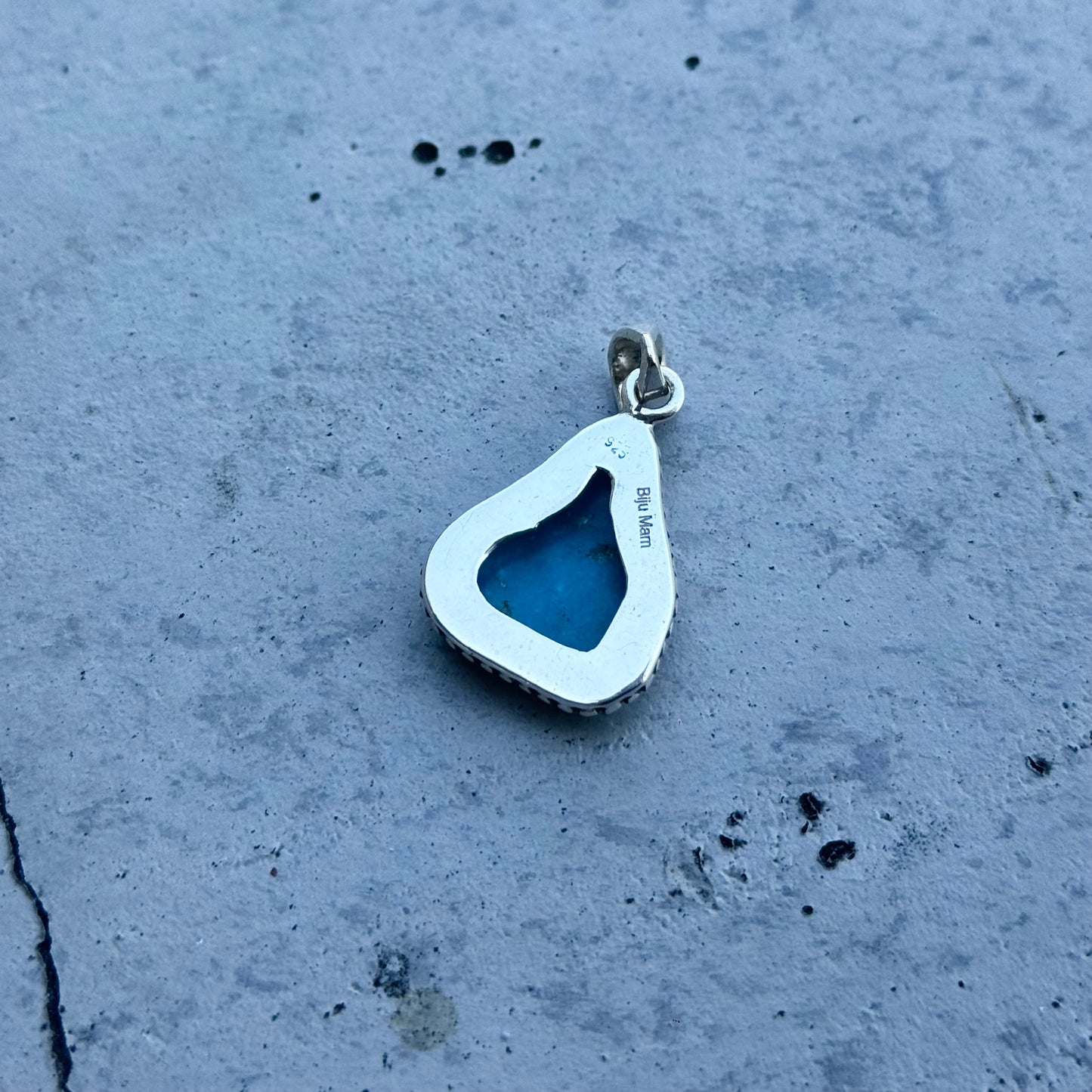 American turquoise charm