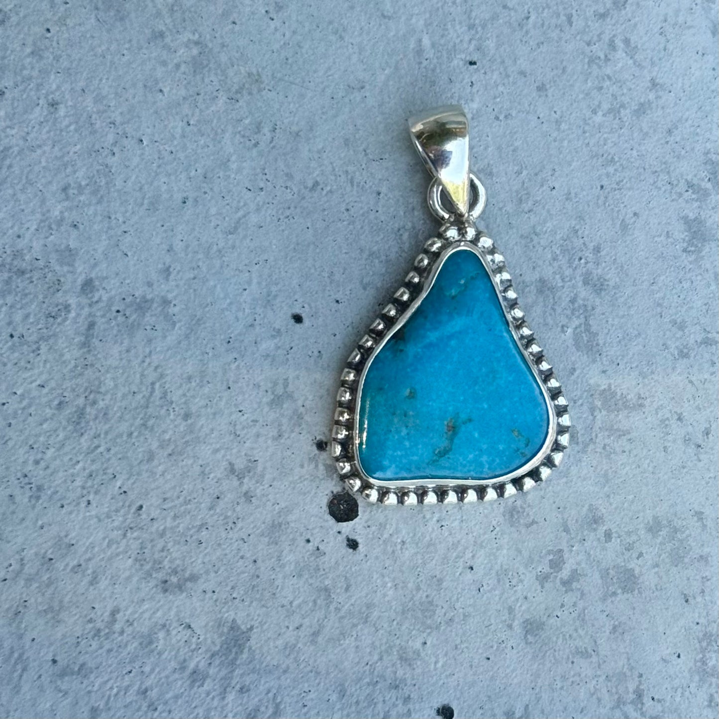 American turquoise charm