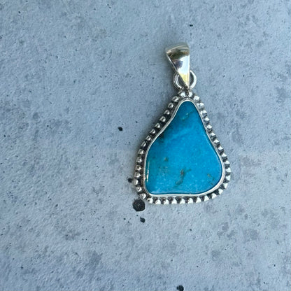 American turquoise charm