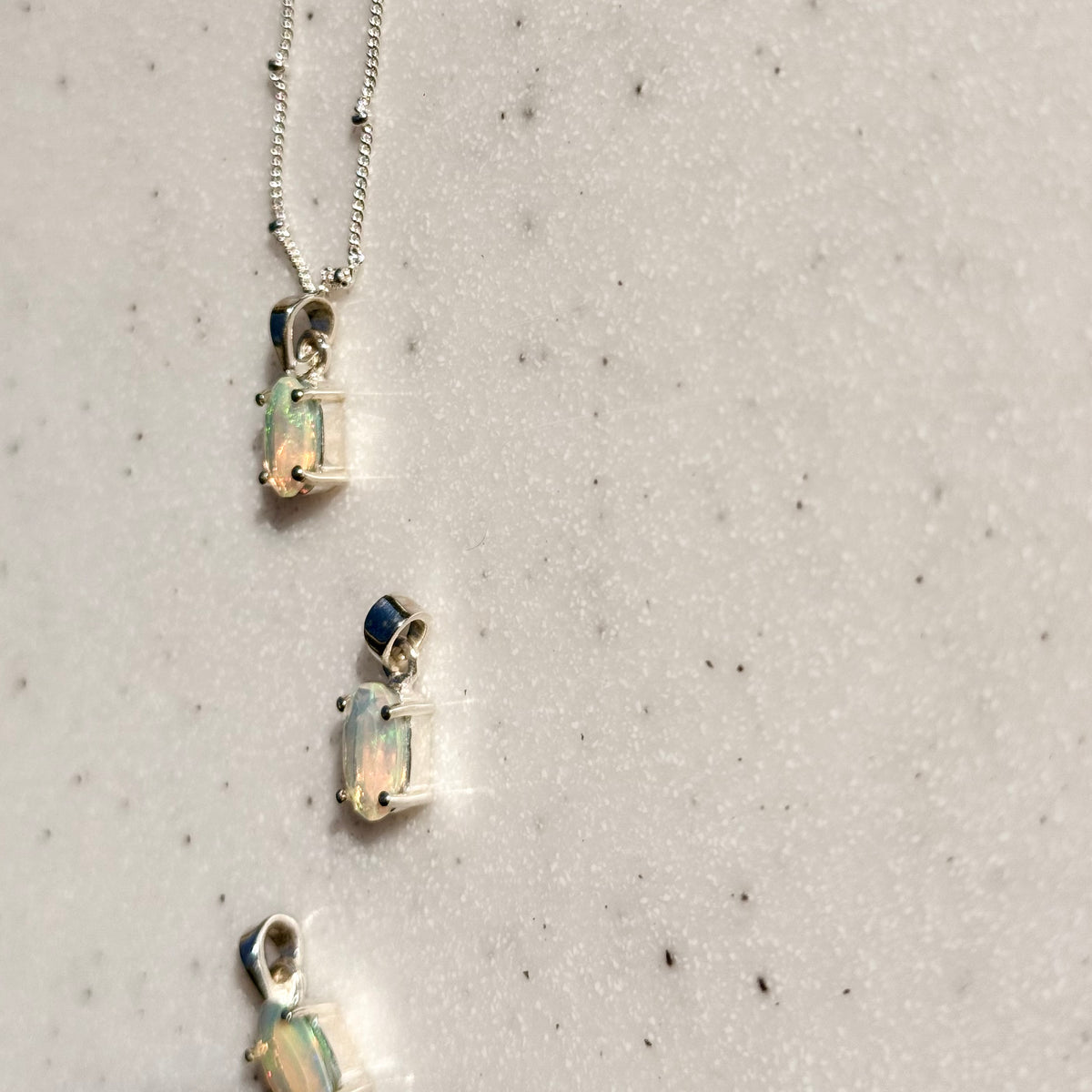 Opal charm