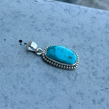 American turquoise charm