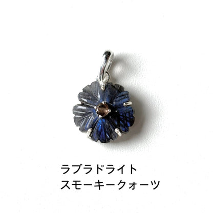 Flower carved charm