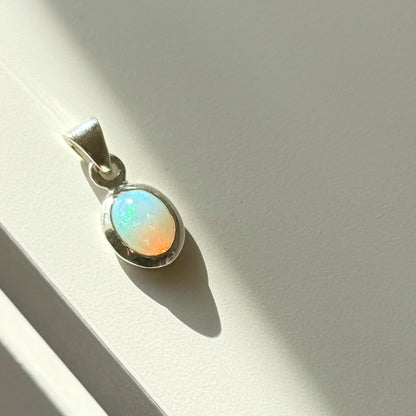 Opal charm