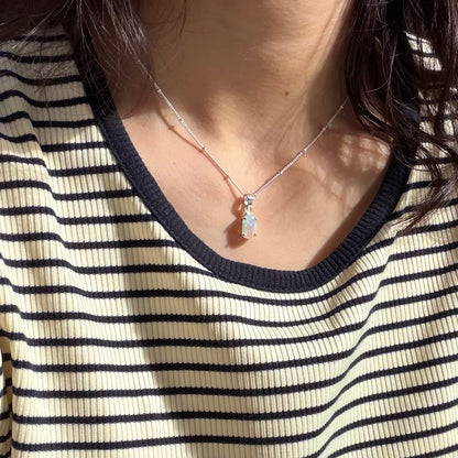 Opal charm